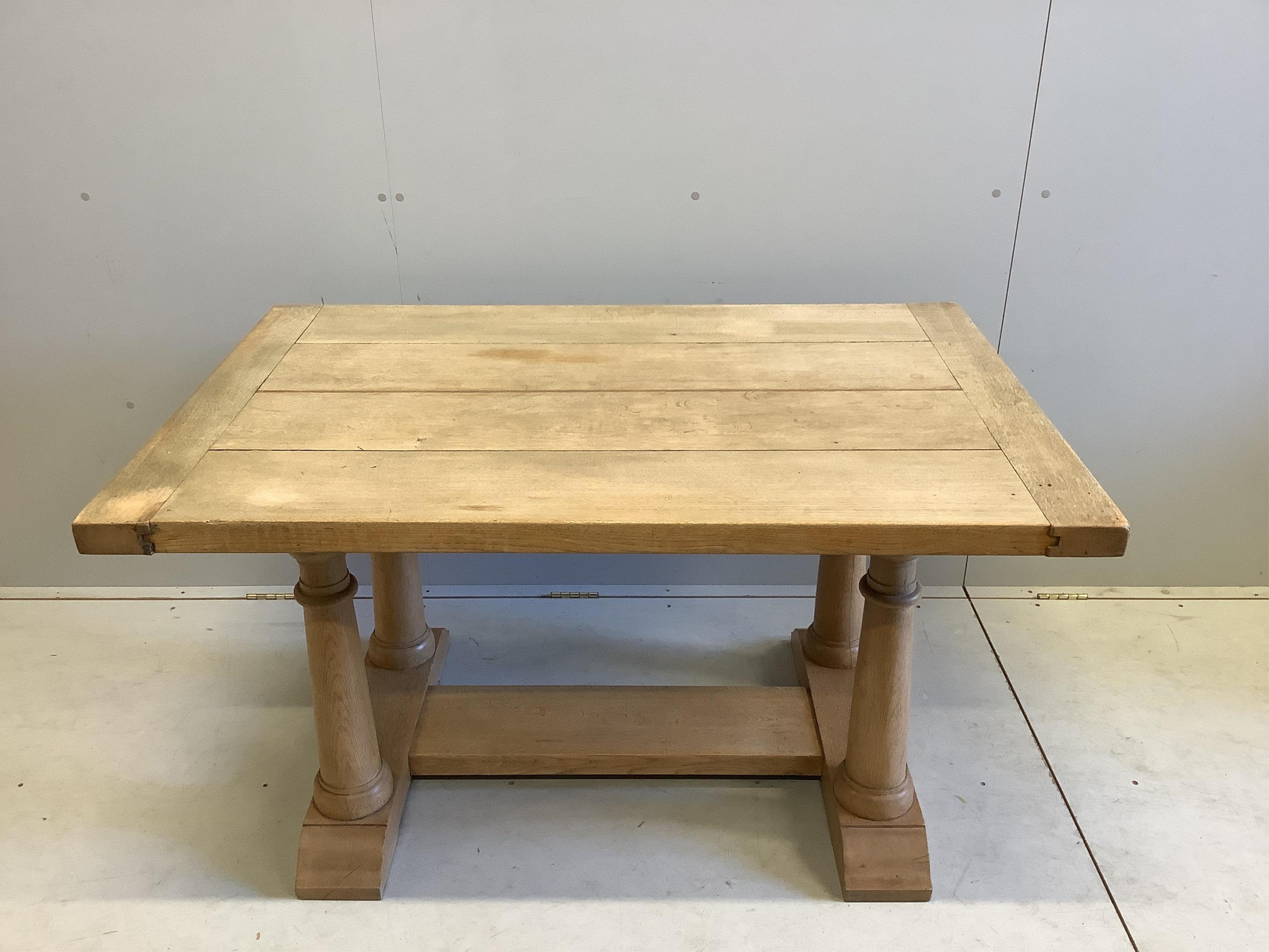 An 18th century style rectangular bleached oak refectory dining table, width 129cm, depth 86cm, height 73cm. Condition - fair